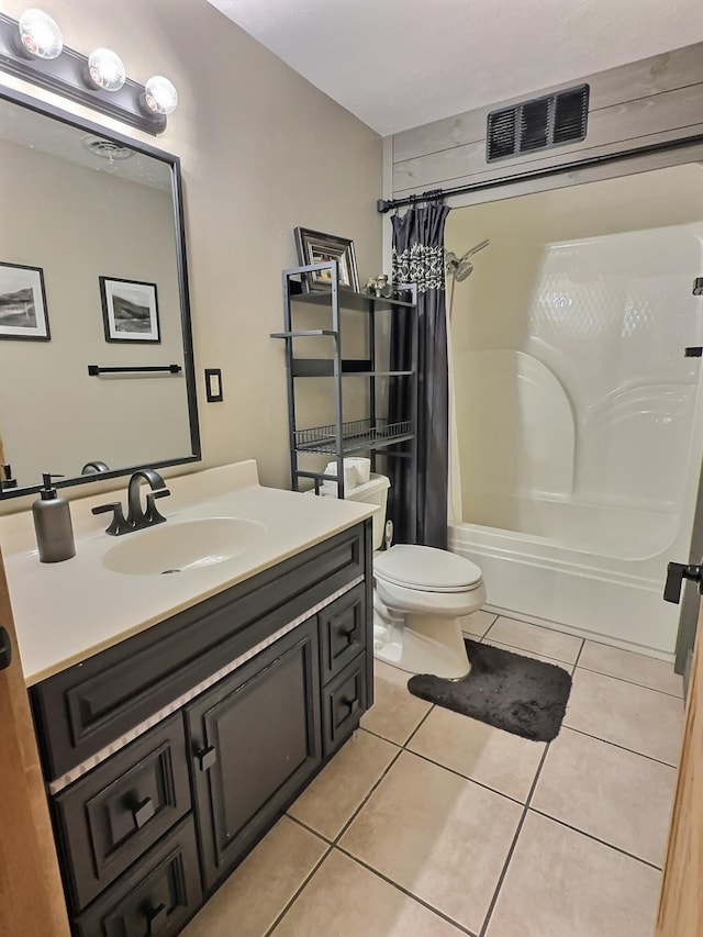 full bathroom featuring tile patterned floors, vanity, toilet, and shower / bathtub combination with curtain