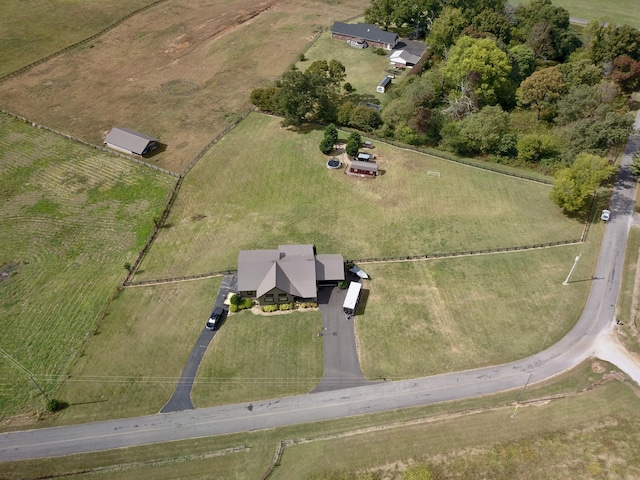 birds eye view of property featuring a rural view