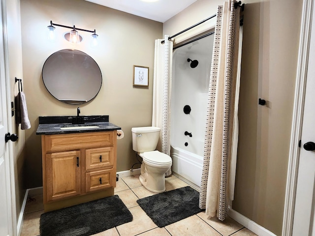 full bathroom featuring tile patterned flooring, vanity, shower / tub combo with curtain, and toilet