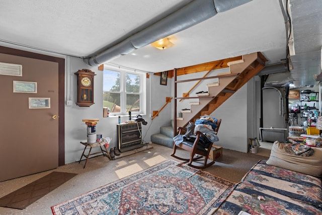 living room with a textured ceiling