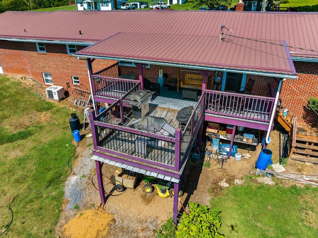 rear view of house with a deck