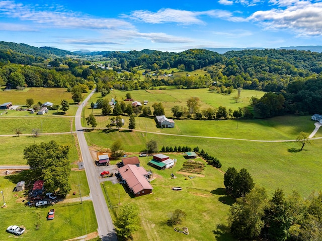 birds eye view of property featuring a rural view