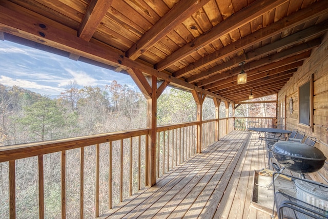 wooden terrace featuring area for grilling