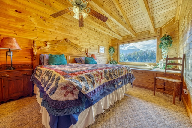 bedroom featuring ceiling fan, light colored carpet, wooden ceiling, and wood walls