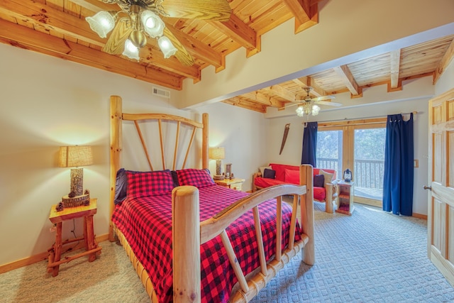 carpeted bedroom with access to exterior, wood ceiling, and beamed ceiling