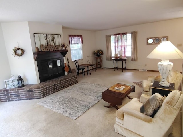 122 Shady Ln, Seymour, TN 37865 - carpeted living area featuring a fireplace and plenty of natural light