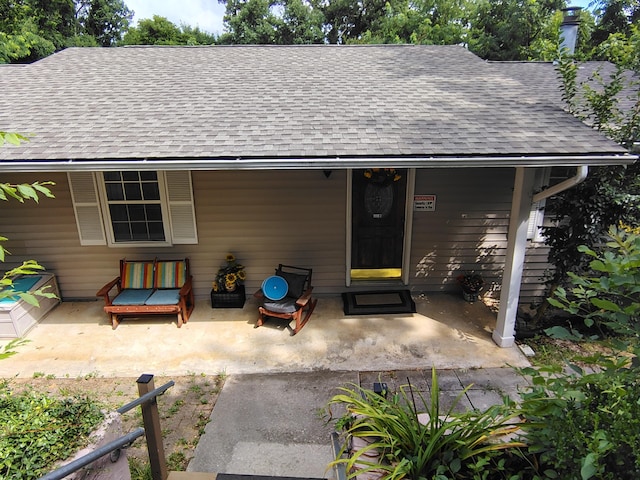 122 Shady Ln, Seymour, TN 37865 - property entrance with roof with shingles