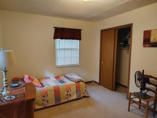 122 Shady Ln, Seymour, TN 37865 - bedroom featuring a closet, carpet floors, and a textured ceiling