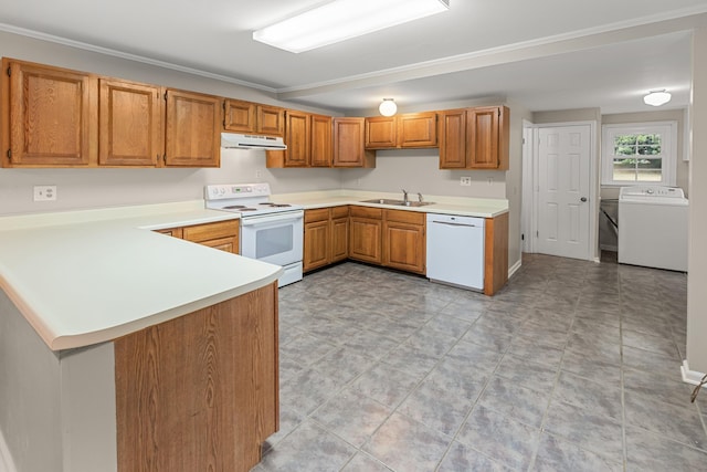 kitchen featuring washer and clothes dryer, white appliances, sink, ornamental molding, and kitchen peninsula