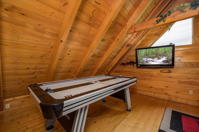 2040 Cougar Crossing Way, Sevierville, TN 37862 - playroom with vaulted ceiling with beams, light wood-style floors, wooden ceiling, and wood walls