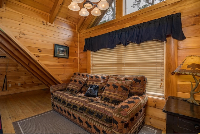 2040 Cougar Crossing Way, Sevierville, TN 37862 - bedroom featuring vaulted ceiling with beams, wooden ceiling, wood walls, wood-type flooring, and an inviting chandelier