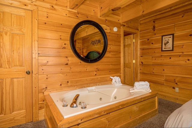 2040 Cougar Crossing Way, Sevierville, TN 37862 - full bathroom with a jetted tub, beam ceiling, and wooden walls
