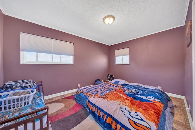 1439 Woods Ridge Rd, Dandridge, TN 37725 - bedroom featuring crown molding and a textured ceiling