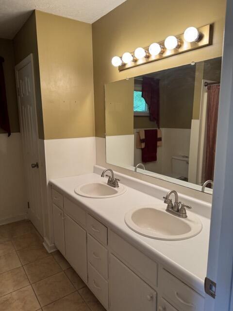 2414 Woodchuck Dell, Morristown, TN 37814 - full bath with double vanity and tile patterned floors