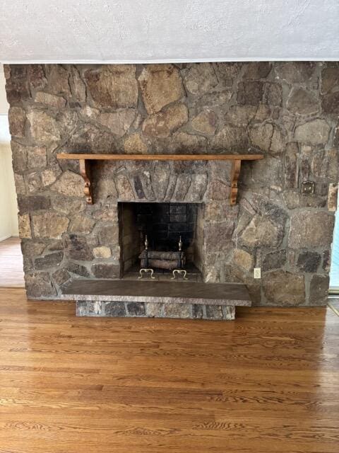 2414 Woodchuck Dell, Morristown, TN 37814 - detailed view of wood finished floors and a fireplace