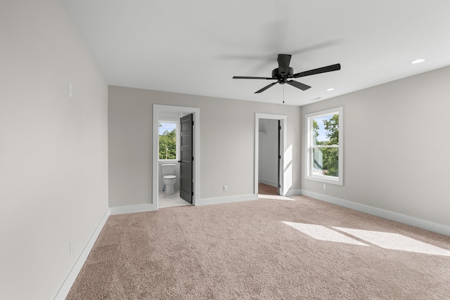 274A W Main St, Dandridge, TN 37725 - unfurnished bedroom with multiple windows, baseboards, light carpet, a spacious closet, and recessed lighting