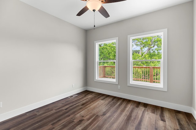 274A W Main St, Dandridge, TN 37725 - empty room featuring baseboards, dark wood-type flooring, and a ceiling fan