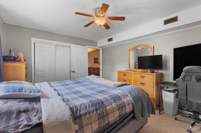 591 Phyllis Cir, Talbott, TN 37877 - bedroom with light colored carpet, a closet, and ceiling fan