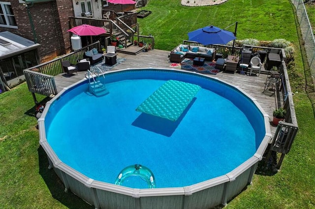 591 Phyllis Cir, Talbott, TN 37877 - view of pool featuring an outdoor living space, a wooden deck, and a lawn