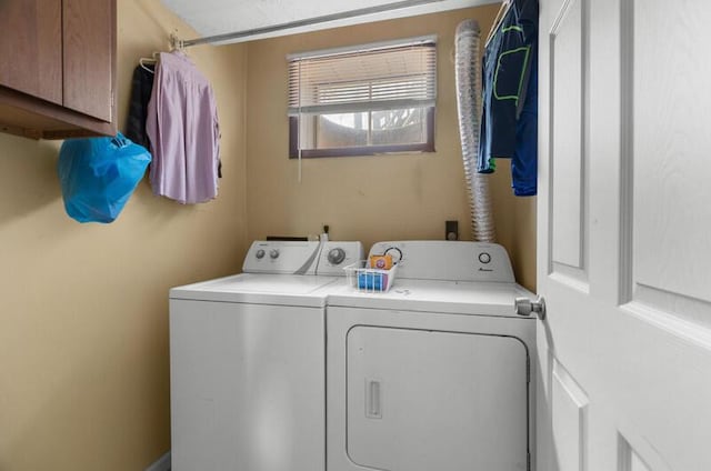 591 Phyllis Cir, Talbott, TN 37877 - laundry area featuring cabinet space and washer and dryer