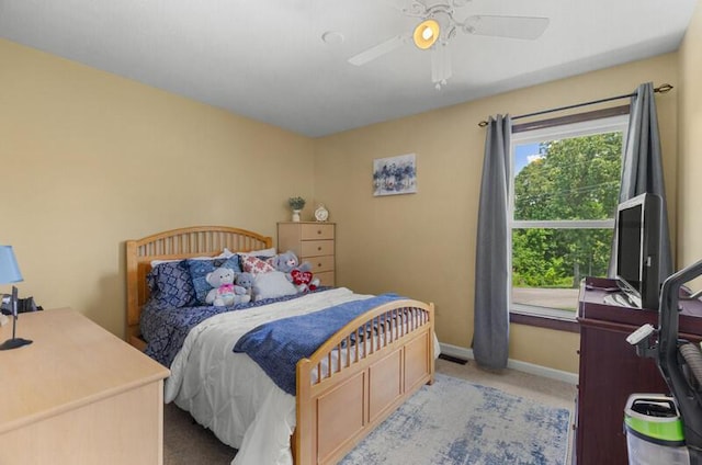 591 Phyllis Cir, Talbott, TN 37877 - bedroom featuring light colored carpet, a ceiling fan, and an office area