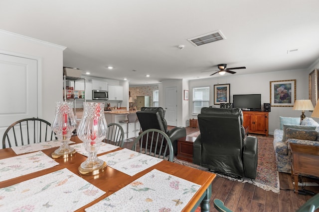 2909 Nicole Cir, Morristown, TN 37814 - dining area featuring dark wood-style flooring, a ceiling fan, ornamental molding, and recessed lighting