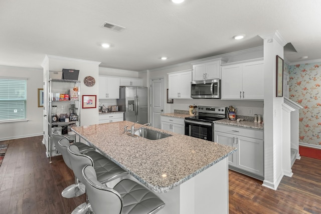 2909 Nicole Cir, Morristown, TN 37814 - kitchen with appliances with stainless steel finishes, a sink, crown molding, baseboards, and dark wood-style floors