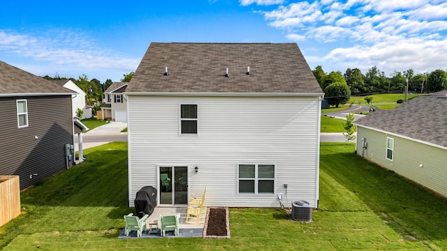 2909 Nicole Cir, Morristown, TN 37814 - back of property with a yard, central air condition unit, a patio, and roof with shingles