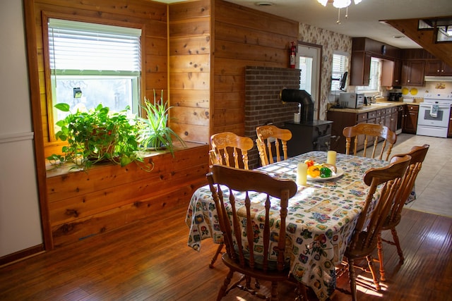 dining room featuring sink and light hardwood / wood-style floors