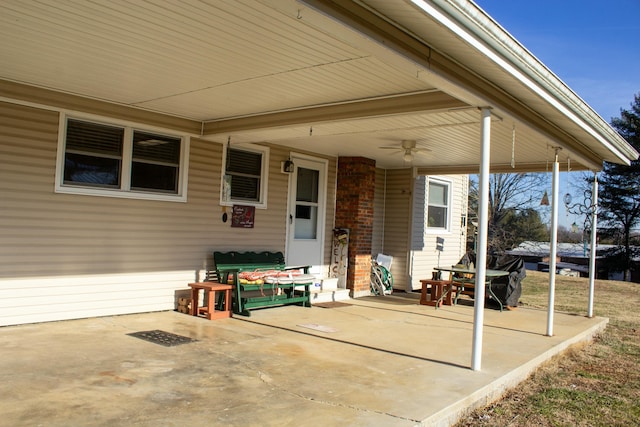 view of patio featuring ceiling fan