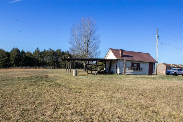 view of yard featuring a carport