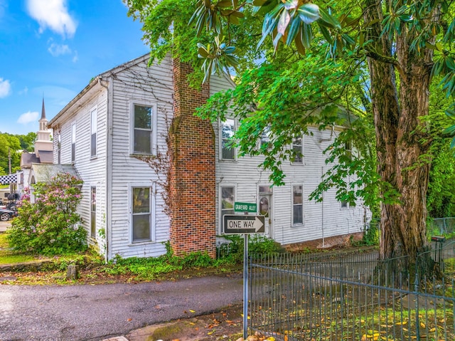 115 E Meeting St, Dandridge, TN 37725 - view of side of home featuring a chimney