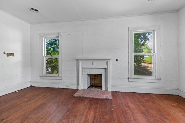 115 E Meeting St, Dandridge, TN 37725 - unfurnished living room with hardwood / wood-style flooring, a brick fireplace, and ornamental molding
