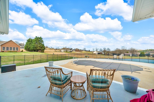 view of patio with a covered pool