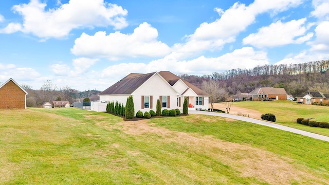 view of front of home with a front lawn