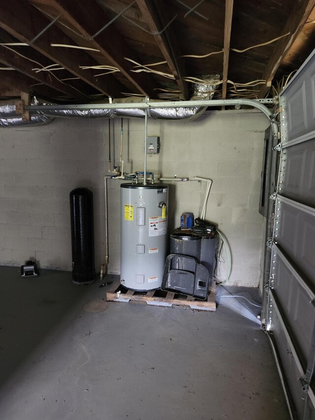 utility room featuring water heater