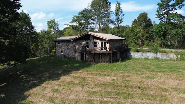 exterior space featuring a wooden deck