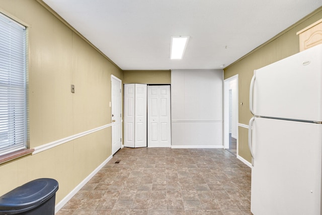 interior space with white fridge