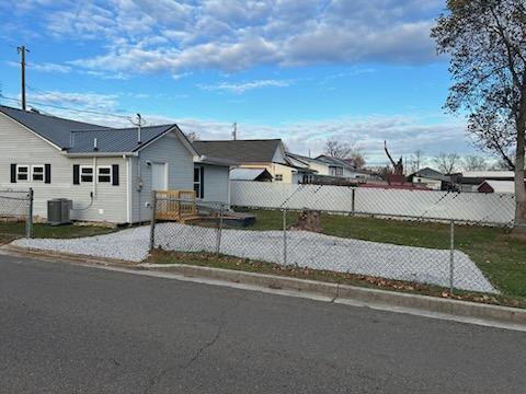 view of front of house with central AC unit