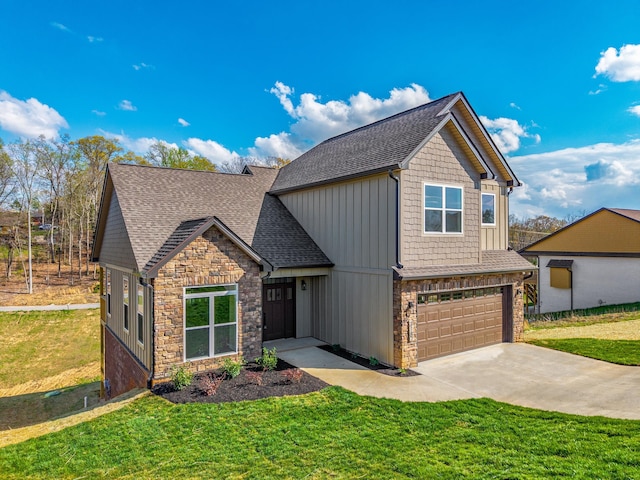craftsman house featuring concrete driveway, an attached garage, stone siding, and a front lawn