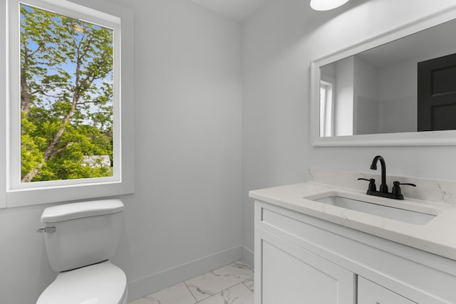 270A W Main St, Dandridge, TN 37725 - half bath featuring vanity, marble look tiles, toilet, and baseboards