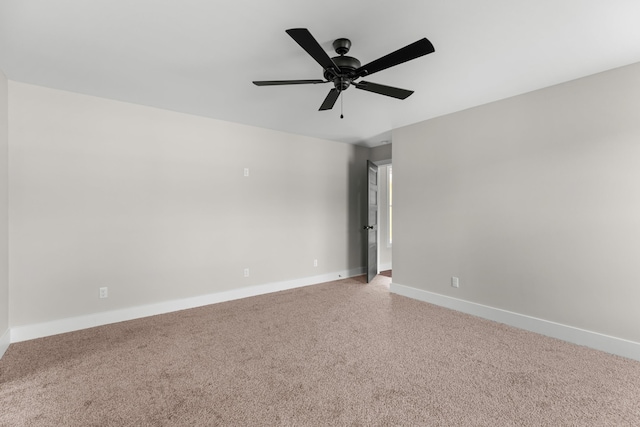 270A W Main St, Dandridge, TN 37725 - spare room featuring baseboards, a ceiling fan, and light carpet