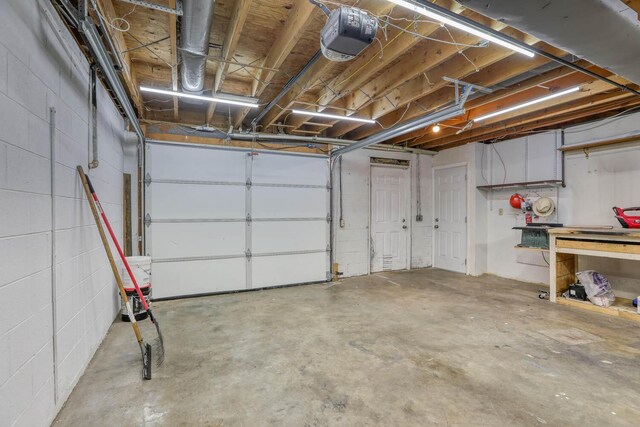 506 Viola Cir, Mount Carmel, TN 37645 - garage featuring a garage door opener