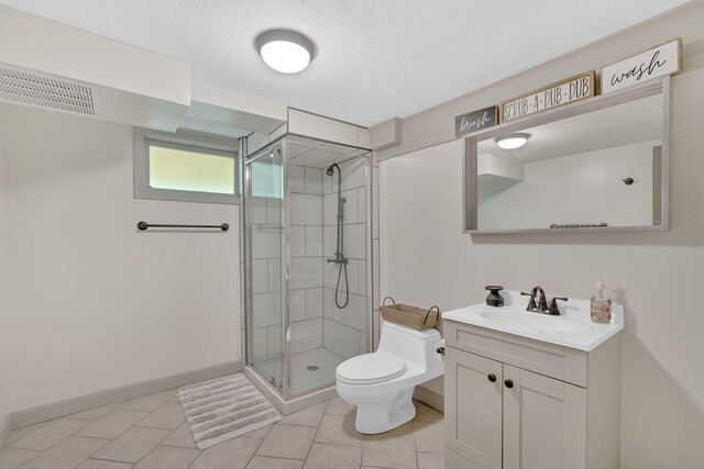 2306 Mountain Dr, Kingsport, TN 37664 - bathroom with toilet, a stall shower, vanity, tile patterned floors, and a textured ceiling