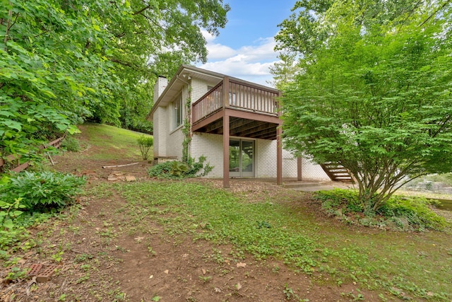 2306 Mountain Dr, Kingsport, TN 37664 - back of house featuring a chimney, a deck, and brick siding