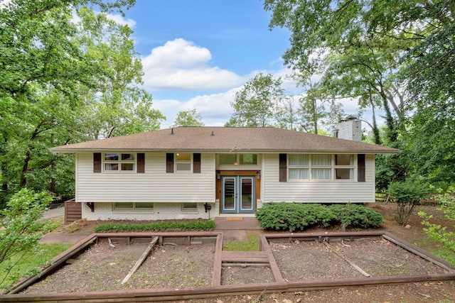 2306 Mountain Dr, Kingsport, TN 37664 - split foyer home featuring a vegetable garden, a chimney, french doors, and uncovered parking