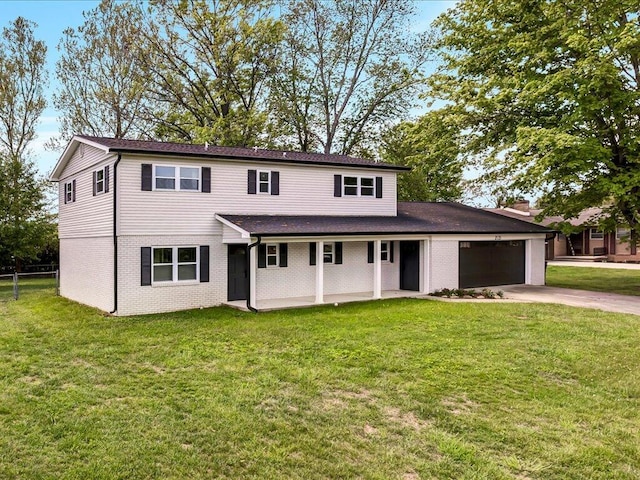 2121 Collins St, Morristown, TN 37814 - traditional-style house featuring concrete driveway, an attached garage, brick siding, and roof with shingles