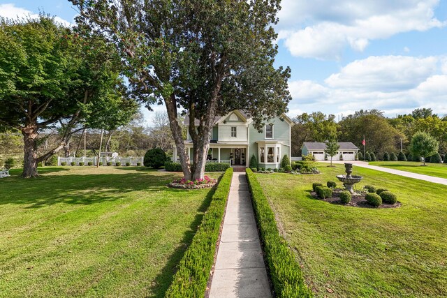 view of front of house featuring a front lawn