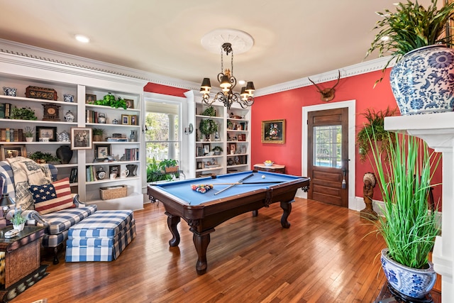 playroom with crown molding, built in features, wood-type flooring, and billiards