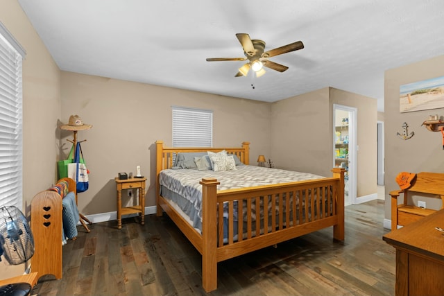 bedroom featuring ceiling fan and dark hardwood / wood-style floors